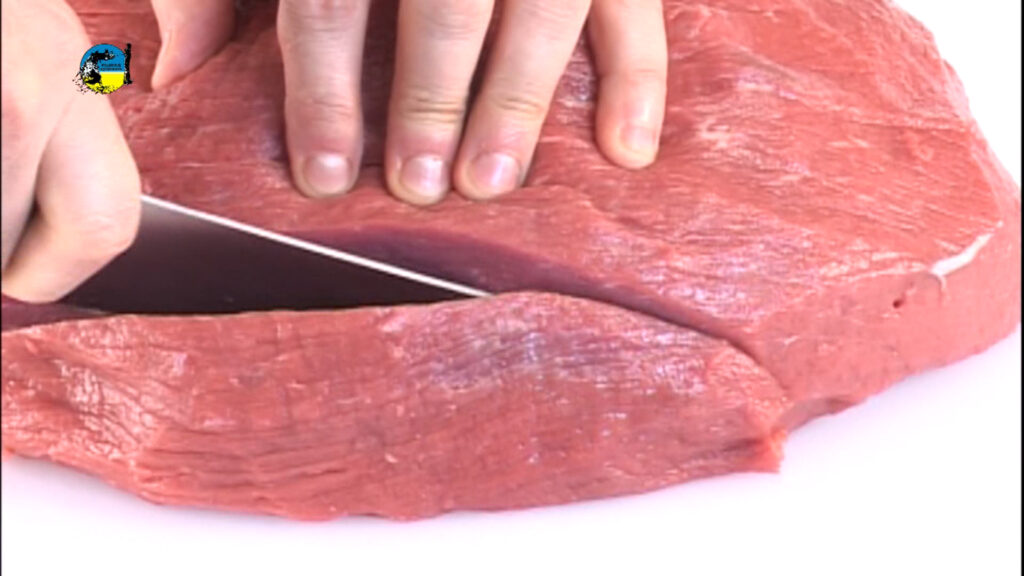 imagen cortando carne un qr para carnicerías habilitadas